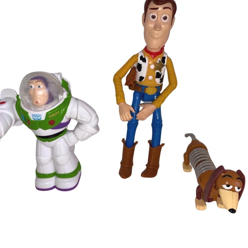 Three Toy Story Characters Buzz, Woody and Slinky Figures